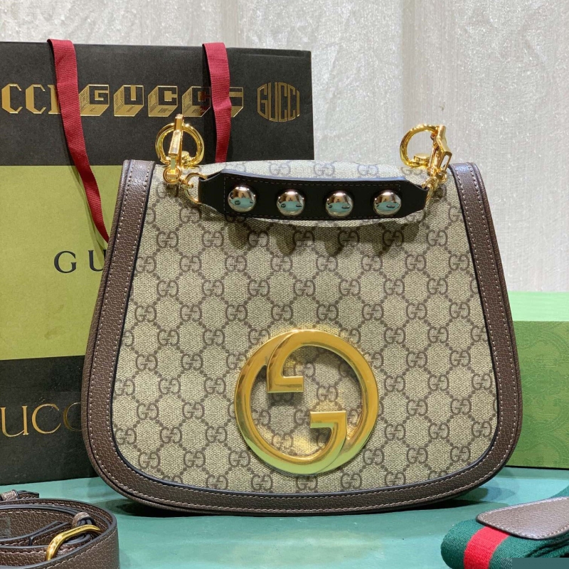 G*u*i top handle bags